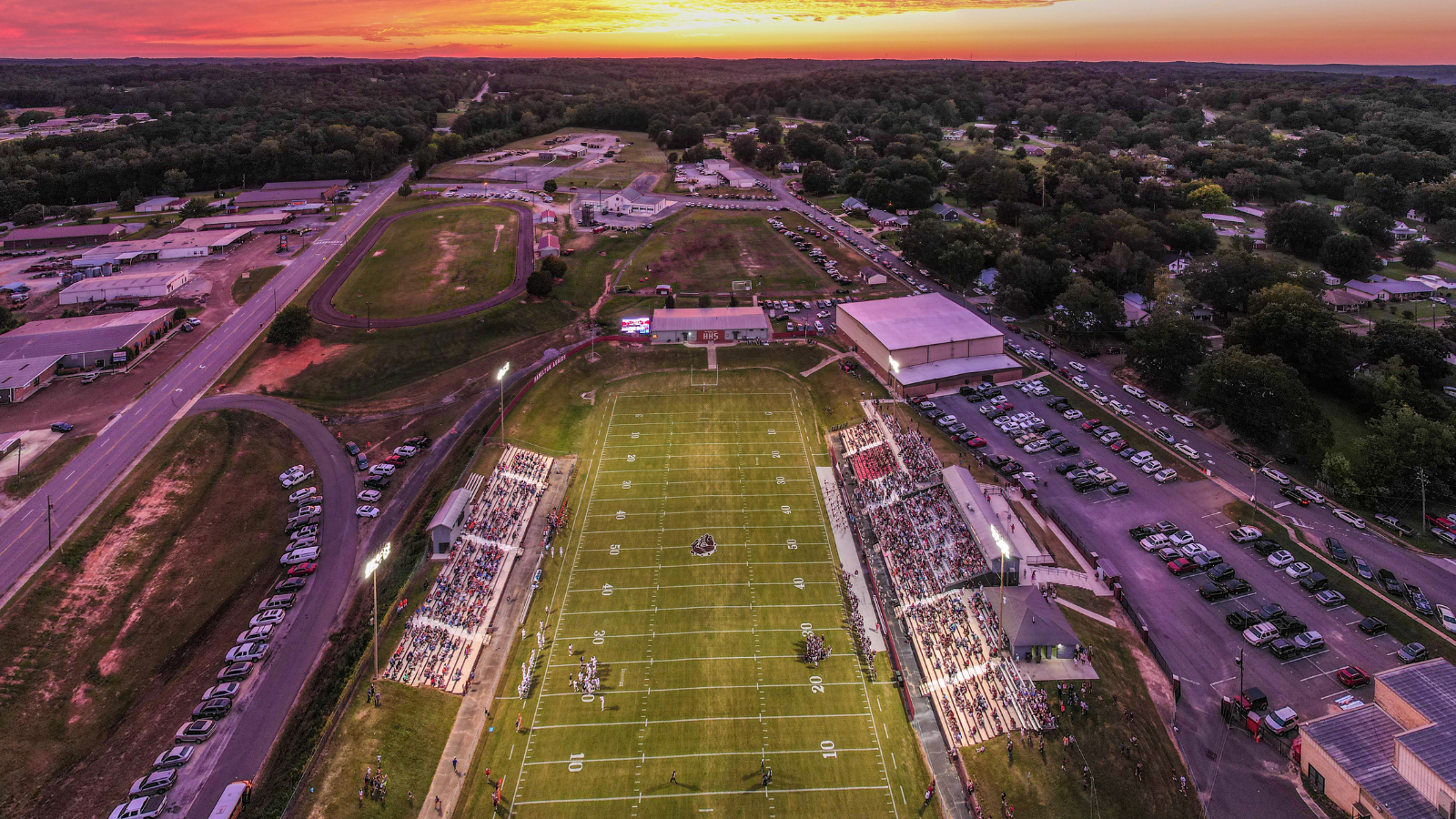 Aerial view of Hamilton school athletic fields at sunset